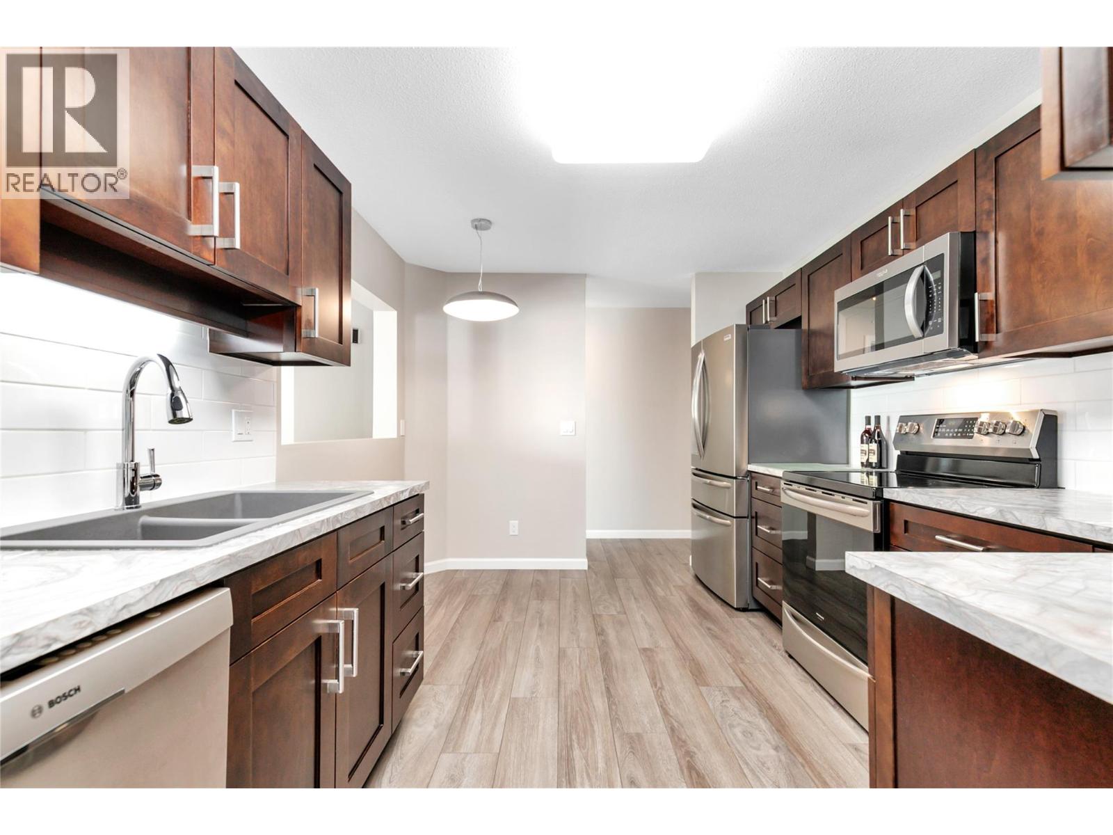 1329 Klo Road Unit# 404, Kelowna, British Columbia  V1W 3N9 - Photo 7 - 10403261