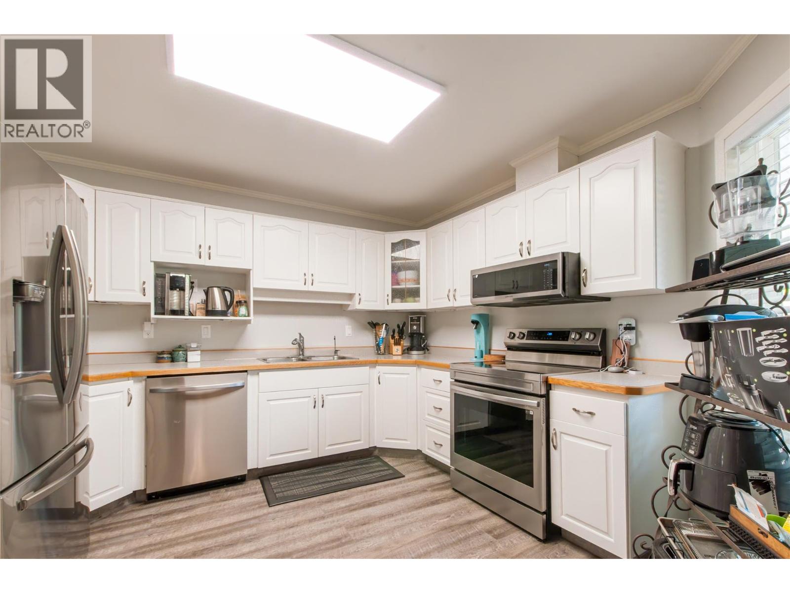115 Redwing Place Unit# 9, Oliver, British Columbia  V0H 1T4 - Photo 2 - 10404114